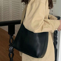 Dorothy Buckle Strap Slouchy Shoulder Bag